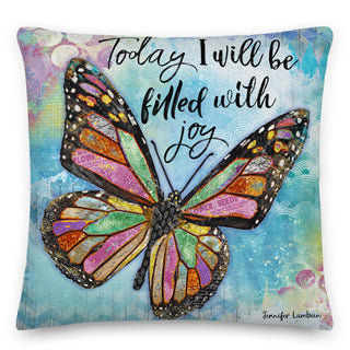 A throw pillow with a colorful butterfly that says today I will be filled with joy. Artwork by Jennifer Lambein. 