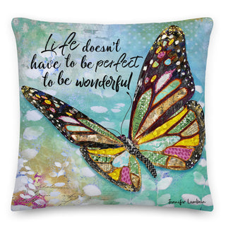 A throw pillow with a butterfly and summer plants that says Life doesn't have to be wonderful to be perfect. Artwork by Jennifer Lambein.