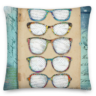 A colorful pillow with five whimsical glasses. Artwork by Jennifer Lambein. 