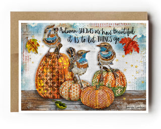 Greeting card with autumn pumpkins, birds and leaves that says Autumn shows us how beautiful it is to let things go. Artwork by Jennifer Lambein. 
