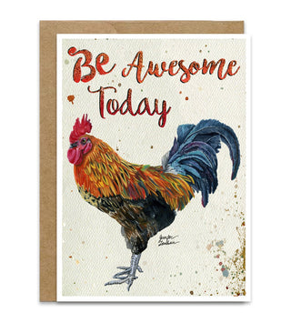 A greeting card with a kraft paper envelope, featuring a watercolor-style rooster and the text 'Be Awesome Today' in red script on a cream textured background. Artwork by Jennifer Lambein. 