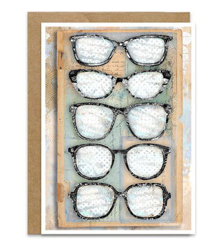 Card with five pairs of whimsical black and white eyeglasses arranged in a grid on a vintage book style  textured background. Artwork by Jennifer Lambein. 