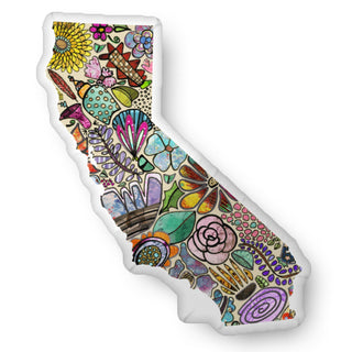 A custom shaped throw pillow shaped like the state of California with wildflowers inside. Artwork by Jennifer Lambein. 