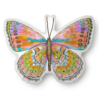 A custom shaped throw pillow shaped like a colorful butterfly. Artwork by Jennifer Lambein. 