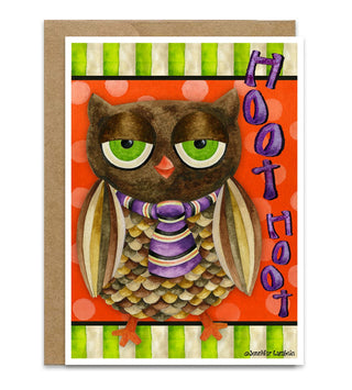 A greeting card featuring a whimsical owl illustration with green eyes, brown feathers, and a purple striped tie, alongside the text 'Hoot Hoot' in purple. The card is shown with a brown kraft envelope behind it on a white background. Artwork by Jennifer Lambein. 