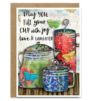 Greeting card with colorful teapots and text 'May you fill your cup with joy, love & laughter' on a white background.