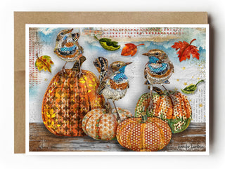 An autumn-themed art print or card featuring decorative pumpkins, birds, and fall leaves, shown with a kraft envelope on a white background.