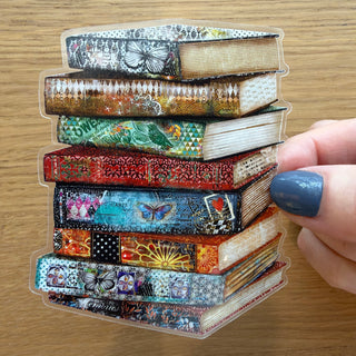 A summery boho cottagecore style stack of books with butterflies sticker. 