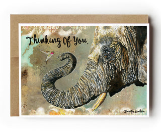 Greeting card with an elephant illustration and 'Thinking Of You' text on a white background