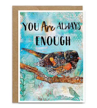A greeting card with a kraft envelope, featuring a watercolor-style bird perched on a branch against a light blue textured background, with the text 'YOU Are ALWAYS ENOUGH' printed on the front.